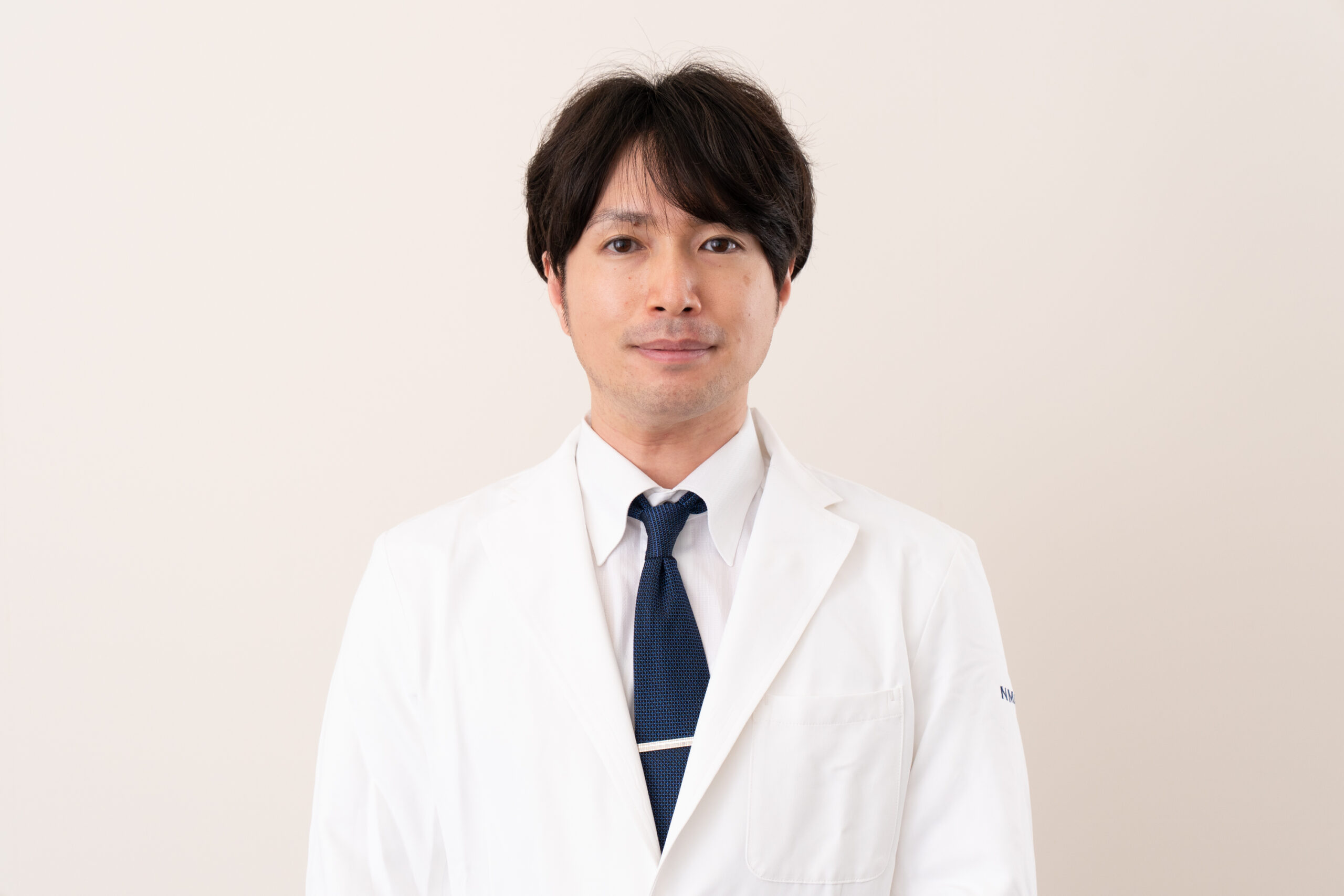 尾関友博